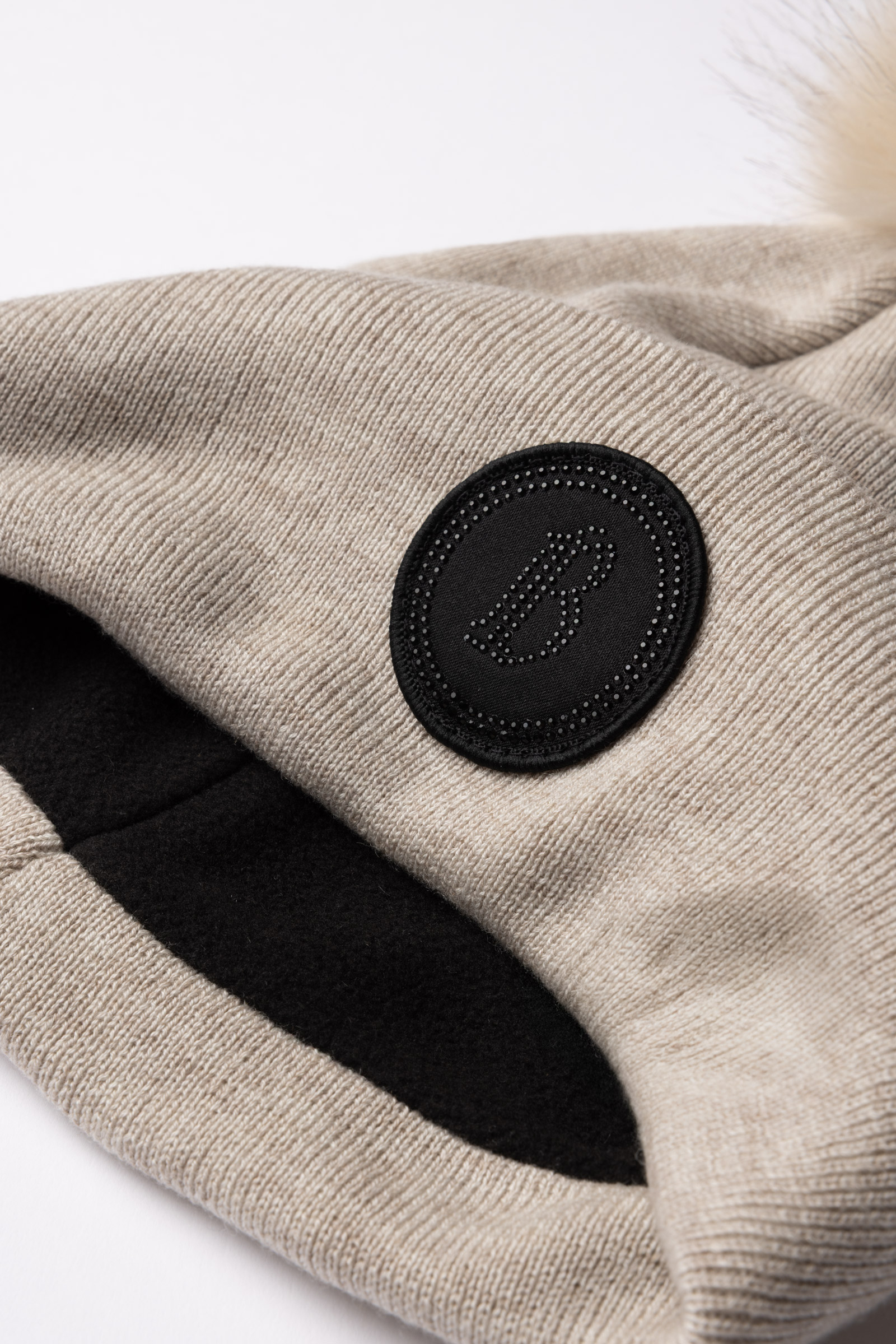 B Vertigo Sydney Gebreide muts met afneembare pompon