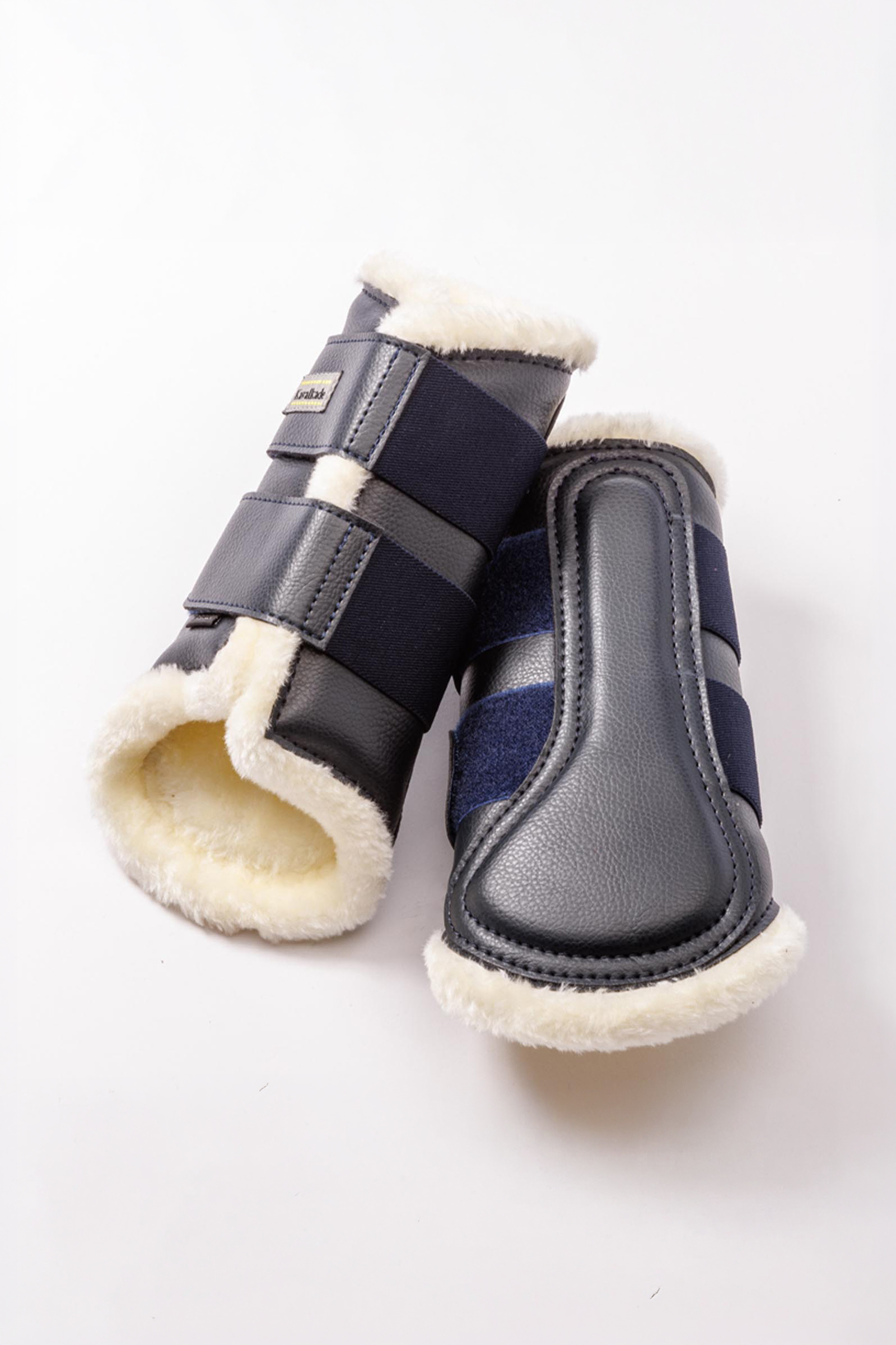 Navy/Beige Kavalkade Anatomic kunstleren beenbeschermers met imitatiebont